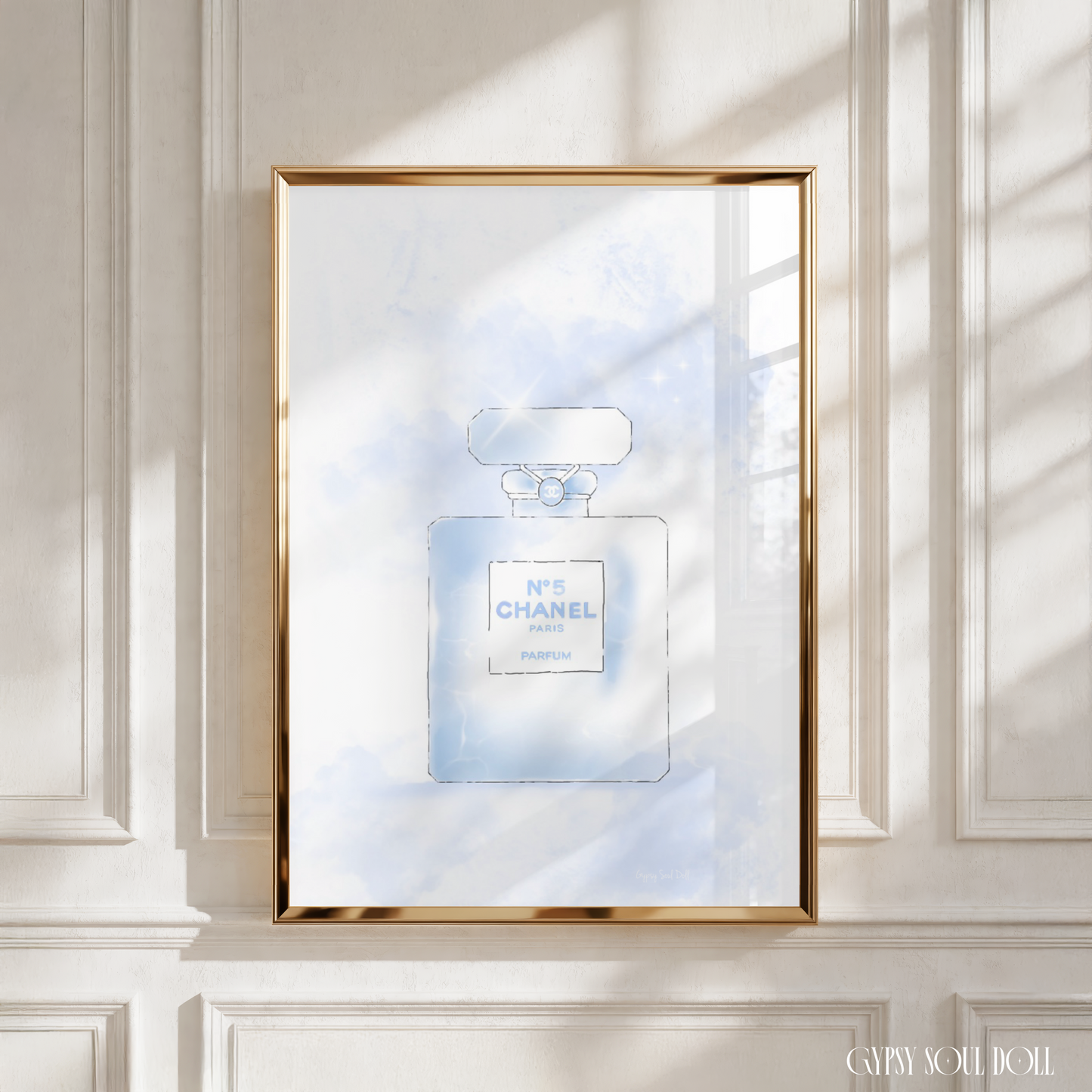 Perfume bottle wall print with Chanel logo on a white background.