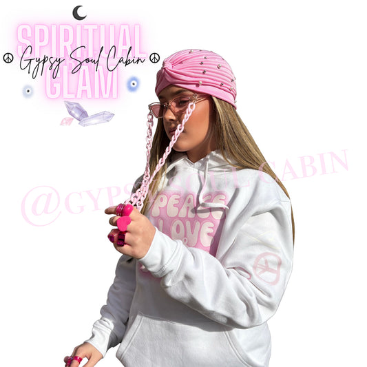 A girl wearing a pink Bohemian gypsy head wrap with added pearls, standing against a white background with text that reads 'Spiritual But Glam' and '@GypsySoulCabin'.