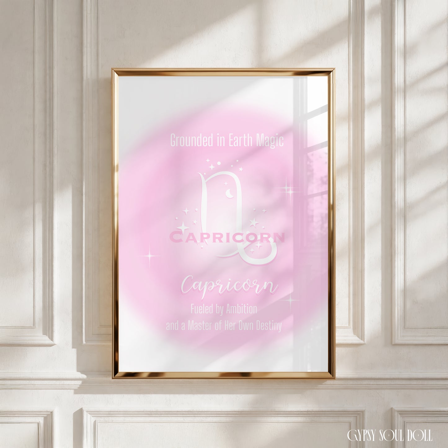 Minimalist A4 astrology wall art print featuring a soft pink aura background with a white Capricorn symbol and gothic typography reading Grounded in Earth Magic, Fueled by Ambition, and a Master of Her Own Destiny.