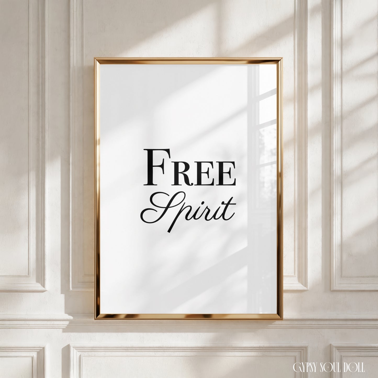 Minimalist black and white typography wall art print displaying the phrase Free Spirit in a stylish mix of elegant script and serif font styles.