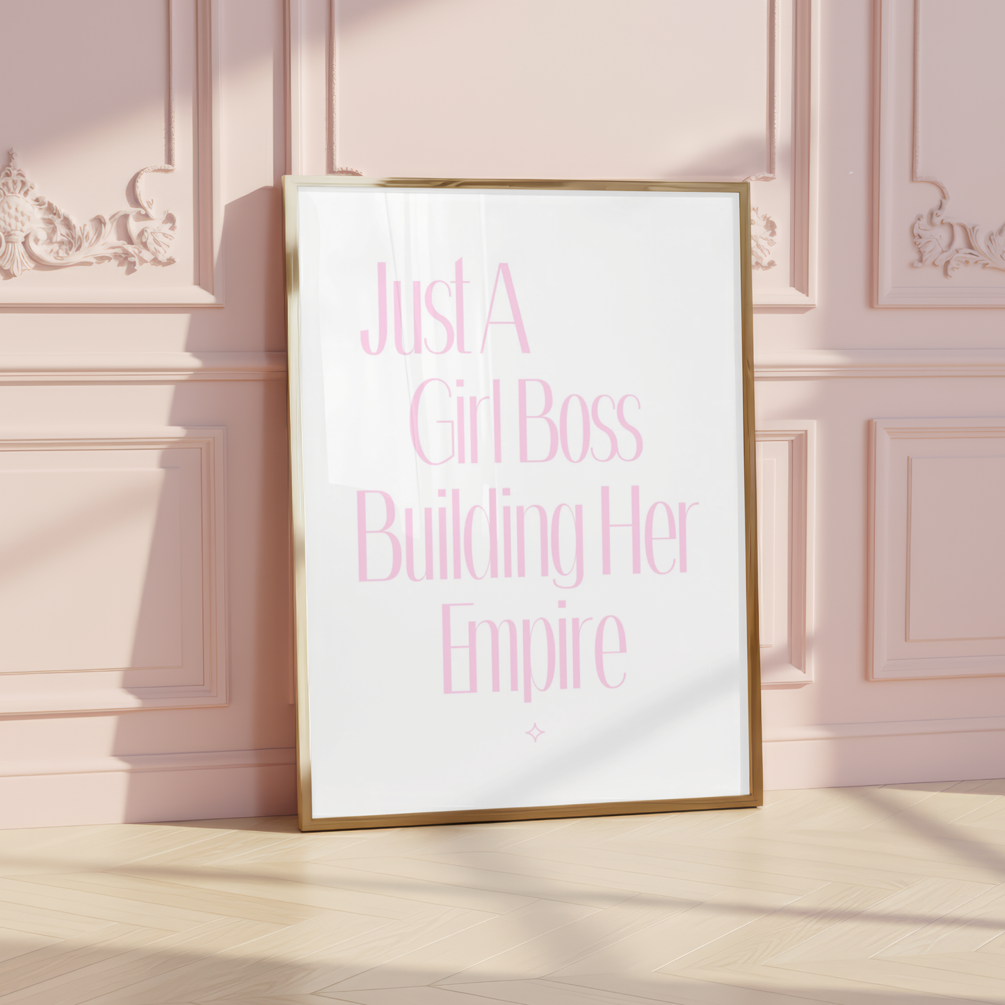 Minimalist pink typography wall art featuring the motivational quote Just A Girl Boss
Building Her Empire with a subtle star sparkle accent at the bottom.
