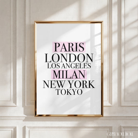 Minimalist black and white A4 fashion typography print featuring a vertical list of global capitals, Paris, London, Los Angeles, Milan, New York, and Tokyo, with Paris and Milan stylised in soft pink highlight blocks.