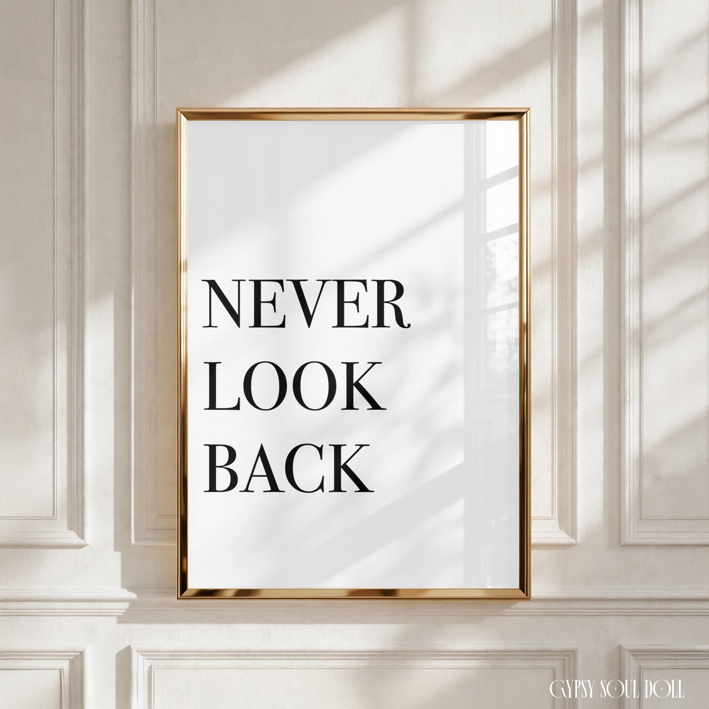 Bold motivation wall decor print featuring the minimalist forward-moving slogan "NEVER LOOK BACK" in clean black typography over a crisp white background.