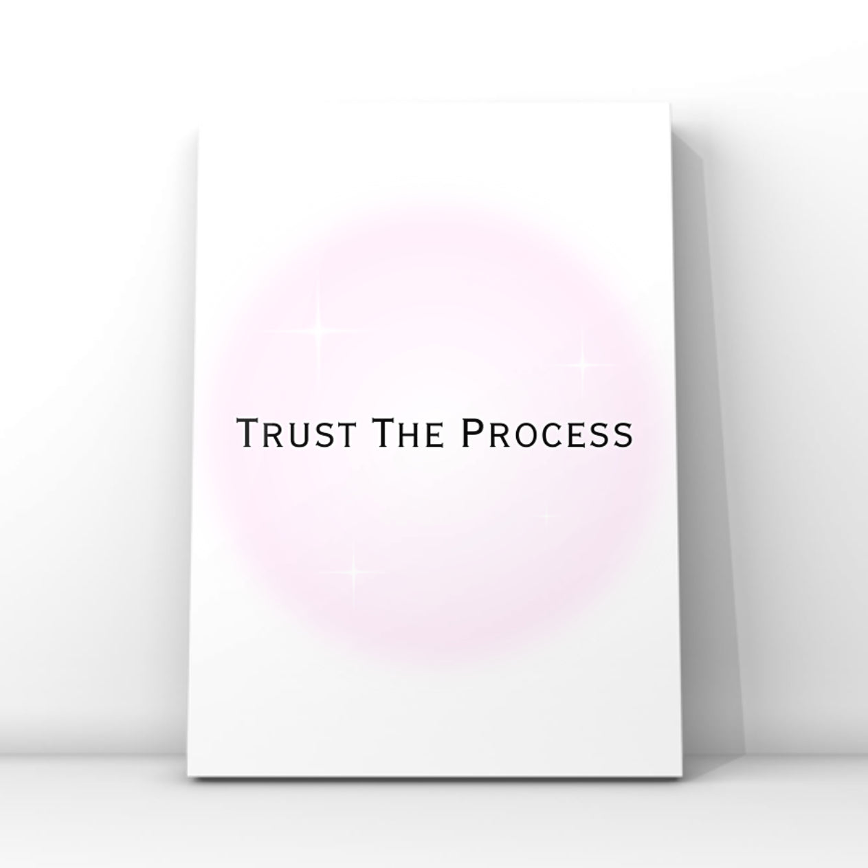 Independent doll motivation quote poster displaying the text Trust The Process in a modern font over a dreamy pastel pink aura circle.