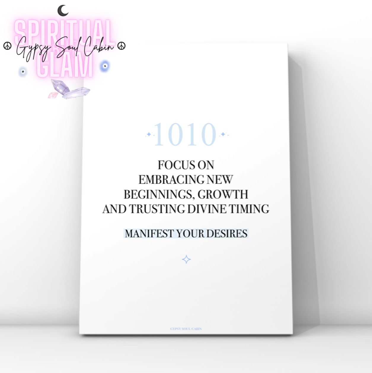 Minimalist typography print featuring a blue 1010 angel number and a pastel blue background highlight behind the words Manifest Your Desires.