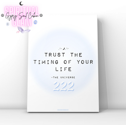 Soft girl aesthetic typography art print reading Trust The Timing Of Your Life with a blue 222 angel number over a pastel blue aura halo.