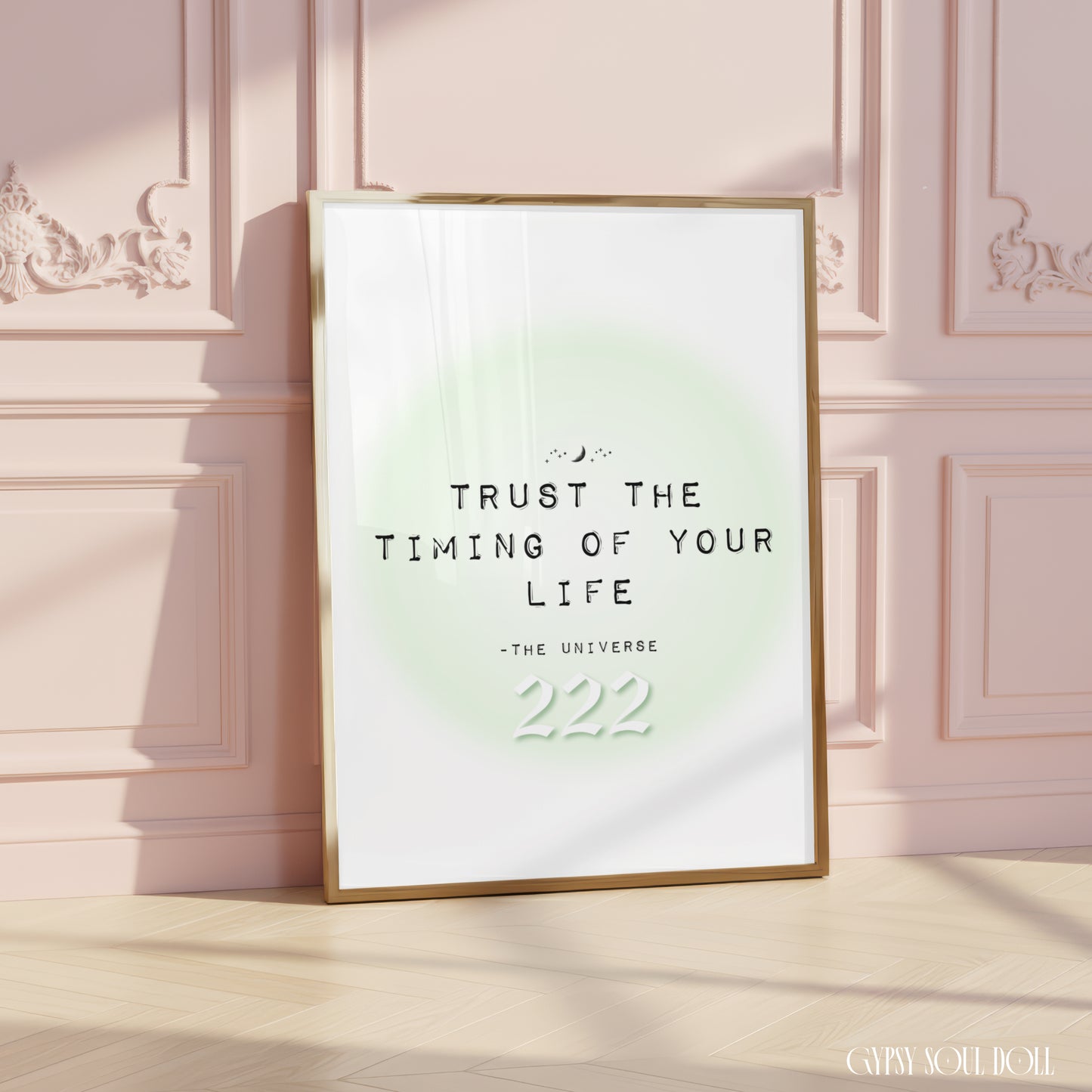 Soft girl aesthetic typography art print reading Trust The Timing Of Your Life with a white 222 angel number over a pastel green aura halo.