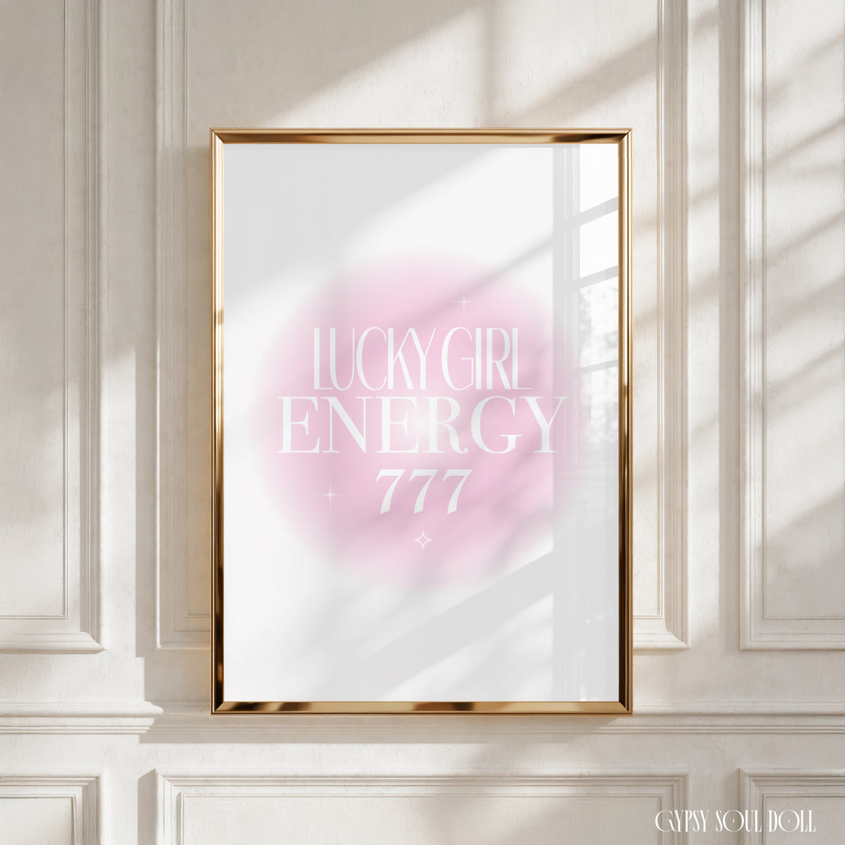 A4 poster print featuring "Lucky Girl Energy" and "+ 777" in clean white editorial typography over a soft pink radial aura gradient background with mini sparkles by Gypsy Soul Doll.