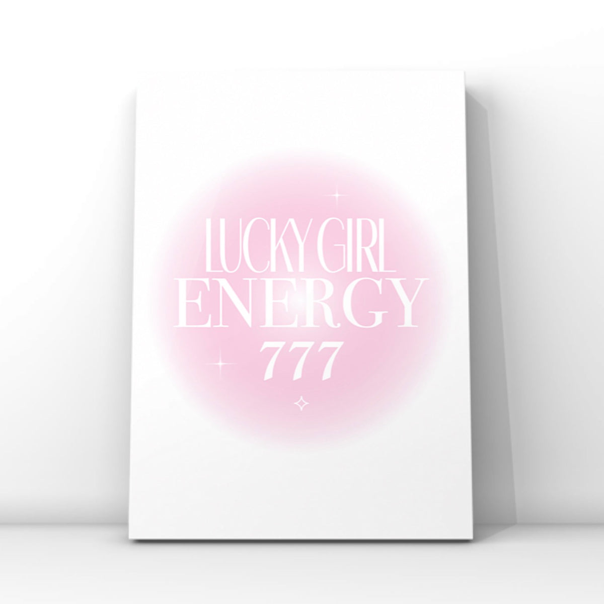 A4 poster print featuring "Lucky Girl Energy" and "+ 777" in clean white editorial typography over a soft pink radial aura gradient background with mini sparkles by Gypsy Soul Doll.