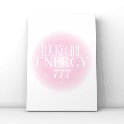 A4 poster print featuring "Lucky Girl Energy" and "+ 777" in clean white editorial typography over a soft pink radial aura gradient background with mini sparkles by Gypsy Soul Doll.