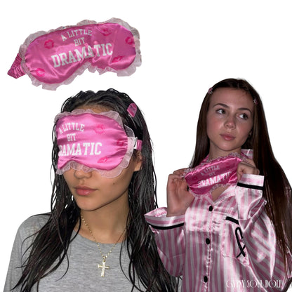 Studio compilation image featuring a girl with wet dark hair wearing a pink ruffled eye mask, another girl with long brown hair in silk pink striped pyjamas holding the mask around her neck, and a standalone view of the pink satin mask above them by Gypsy Soul Doll.