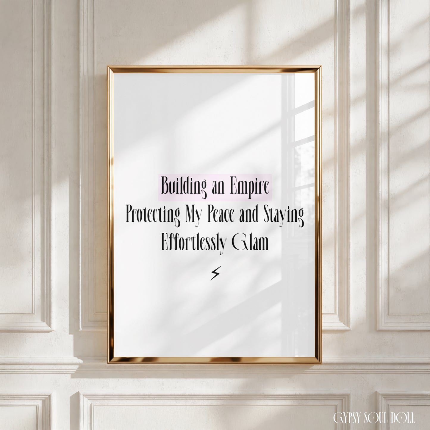 A4 vertical art print with a white background featuring tall black editorial serif typography reading Building an Empire Protecting My Peace and Staying Effortlessly Glam. The phrase Building an Empire is layered over a soft pastel pink highlighter-block accent, with a minimalist black lightning bolt symbol centred beneath the text.