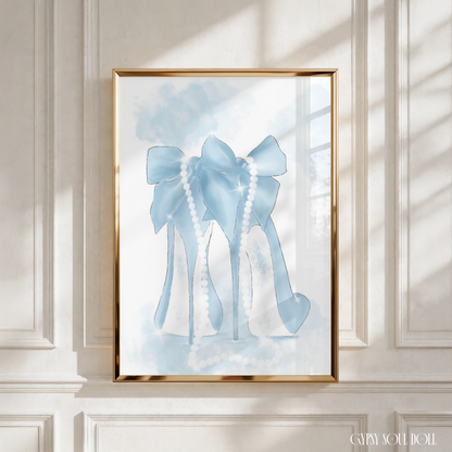 Illustration of a pair of blue fashion heels with a large bow, draped with a string of pearls, set against a light, watercolour background.