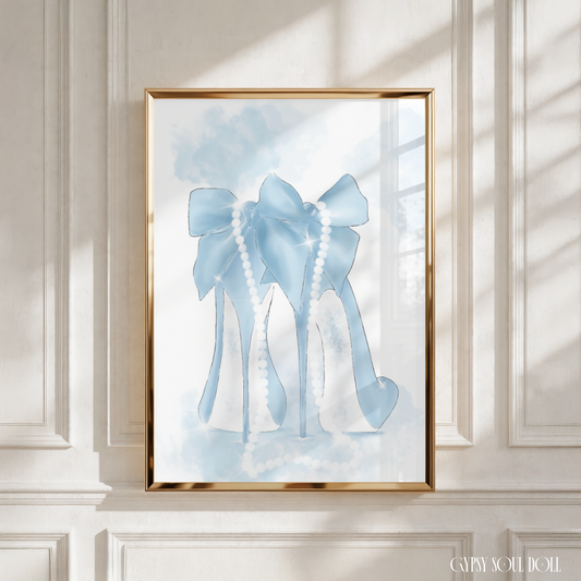 Illustration of a pair of blue fashion heels with a large bow, draped with a string of pearls, set against a light, watercolour background.