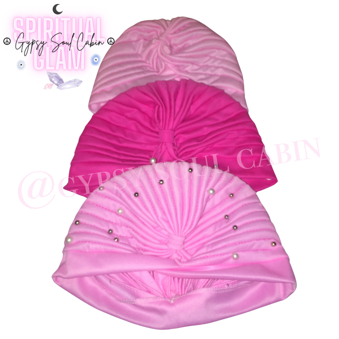 Three pink bohemian gypsy head wraps with a geometric pattern, featuring a band with pearl-like beads and a textured design.