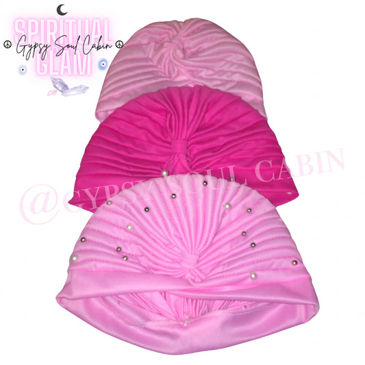 Three pink bohemian gypsy head wraps with a geometric pattern, featuring a band with pearl-like beads and a textured design.