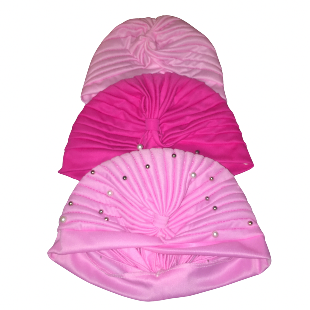 Three pink bohemian gypsy head wraps with a geometric pattern, featuring a band with pearl-like beads and a textured design.