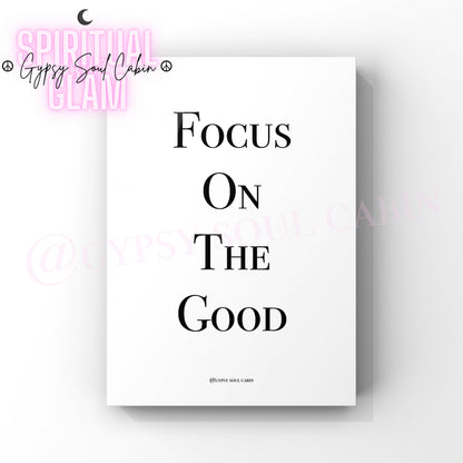 A black and white quote print with the text 'FOCUS ON THE GOOD' on a white background, with a watermark that says 'Gypsy Soul Cabin'.