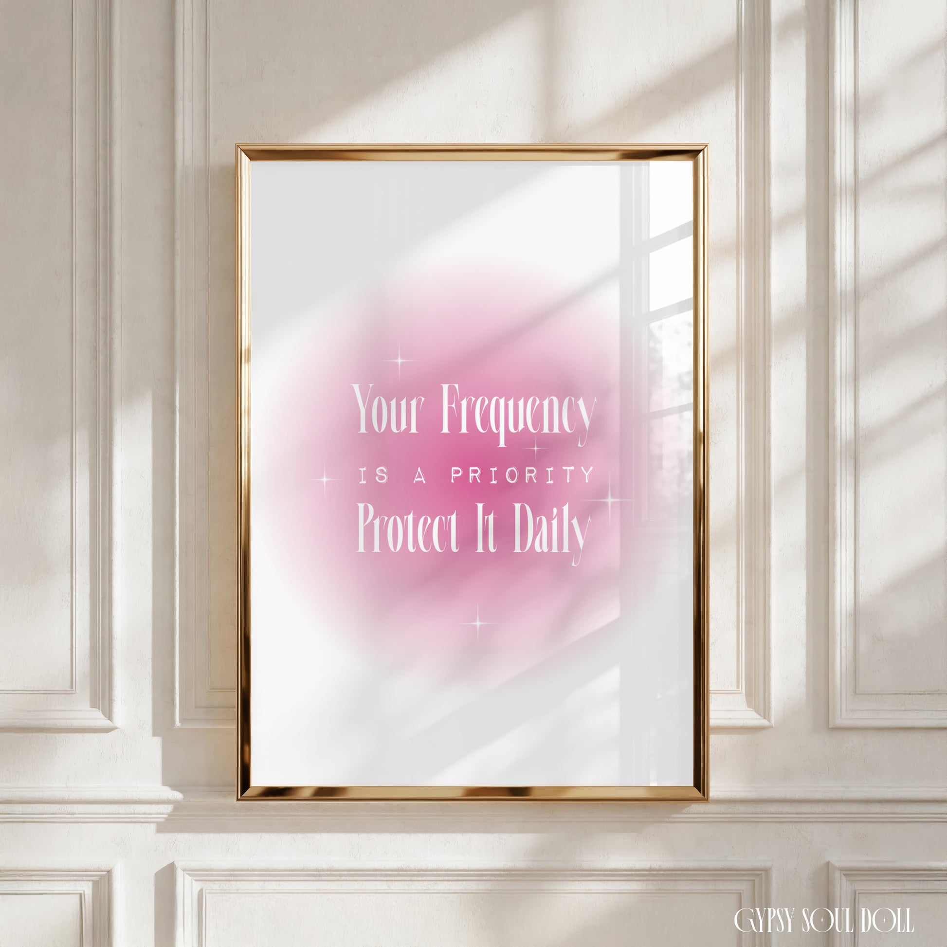 Aesthetic A4 art print featuring a soft-blur pink airbrush aura circle with delicate white Y2K retro star sparkles and typography reading Your Frequency IS A PRIORITY Protect It Daily by Gypsy Soul Doll.