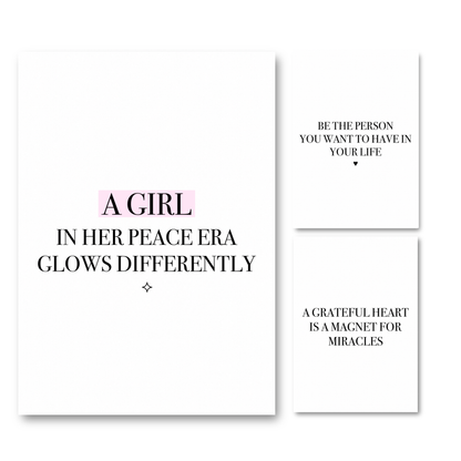 3-piece spiritual manifestation typography art print set featuring a main white print with pink highlighted text reading A Girl In Her Peace Era Glows Differently, a Be The Person You Want To Have In Your Life print, and a A Grateful Heart Is A Magnet For Miracles print.