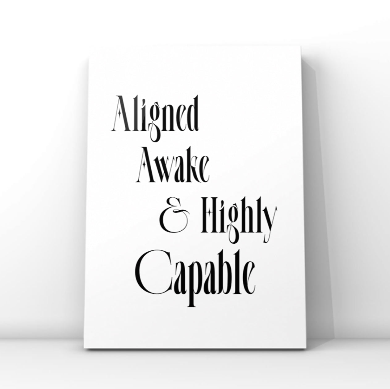 Minimalist A4 black typography wall art print featuring the motivational quote Aligned Awake and Highly Capable centered on a clean white background.