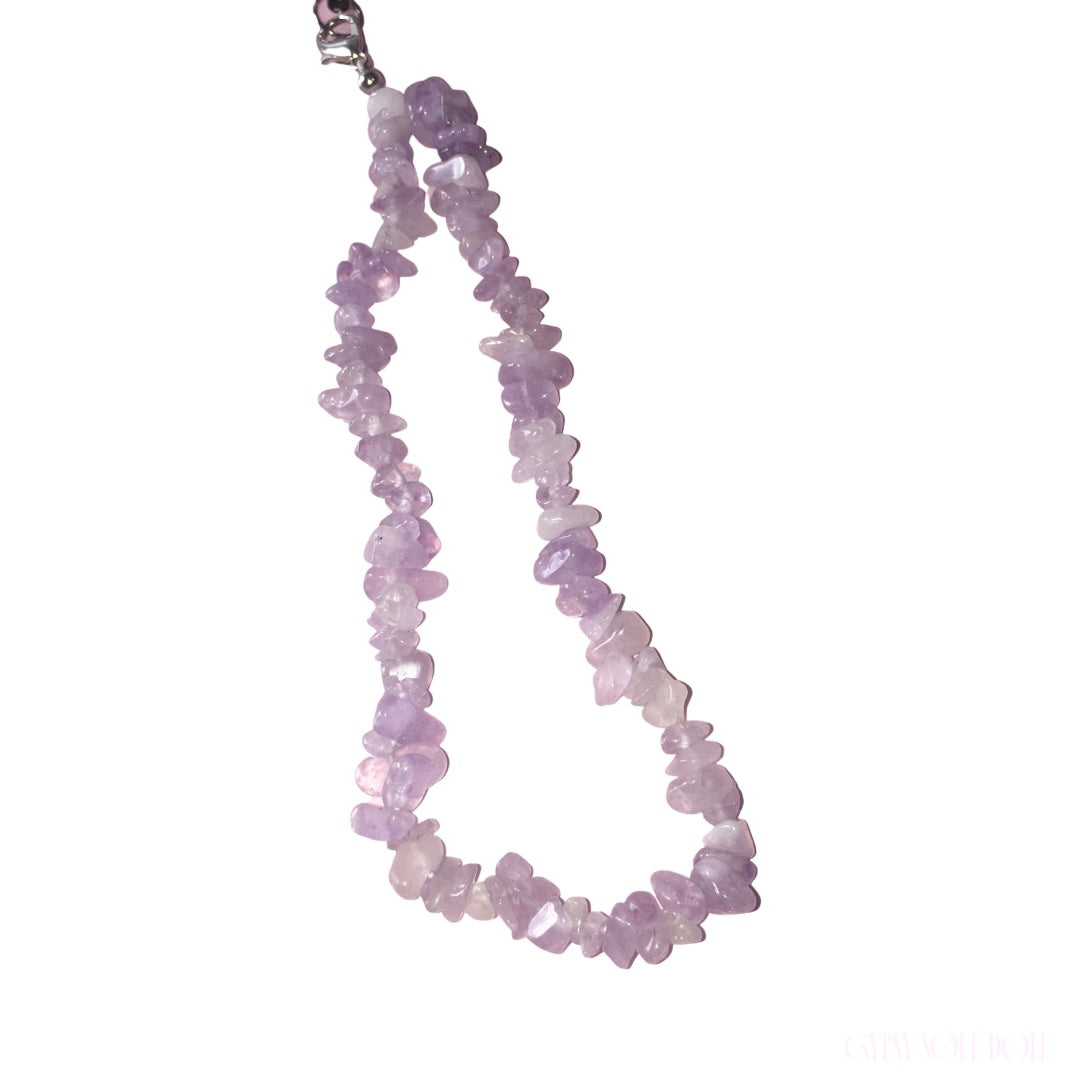 A purple amethyst chip phone lanyard with a silver-toned clasp, shown against a plain white background.