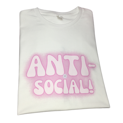Front view of the white cotton Gypsy Soul Cabin T-shirt featuring a bubble text slogan reading Anti-Social and a protective evil eye graphic in pink airbrush graffiti style.