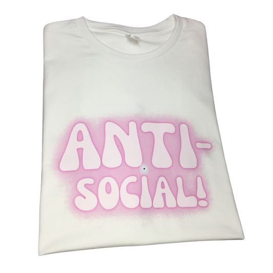 Front view of the white cotton Gypsy Soul Cabin T-shirt featuring a bubble text slogan reading Anti-Social and a protective evil eye graphic in pink airbrush graffiti style.