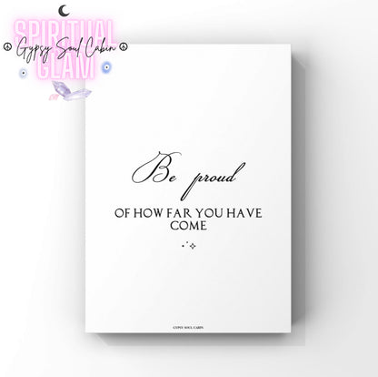 Elegant monochrome self-care wall art combining a fluid cursive script text for Be proud with two tiny, centred celestial sparkle details below.