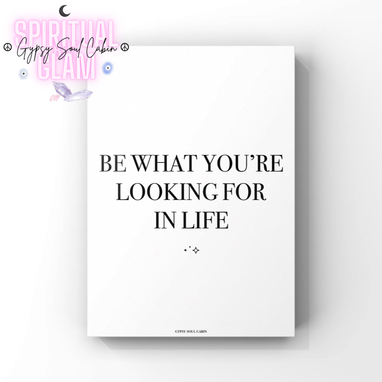 Minimalist monochrome typography poster print displaying the deep manifestation life lesson quote Be What You're Looking For In Life in modern clean block lettering.