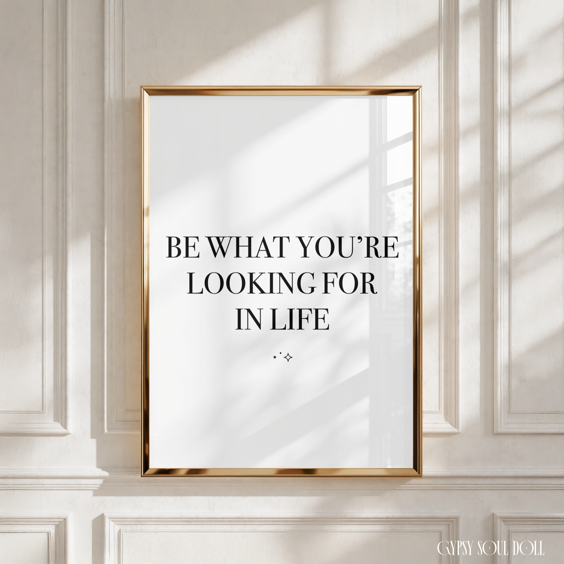 Minimalist monochrome typography poster print displaying the deep manifestation life lesson quote Be What You're Looking For In Life in modern clean block lettering.