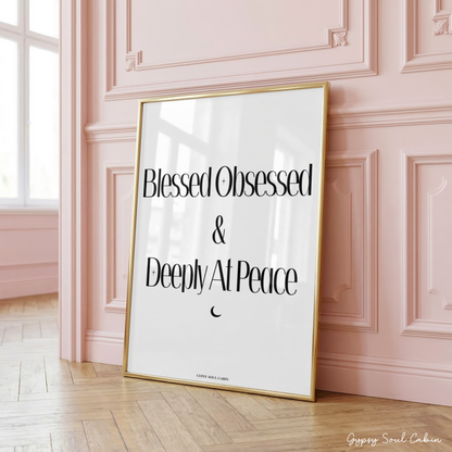 Sleek black and white motivational print displaying the text Blessed Obsessed & Deeply At Peace with a small crescent moon graphic icon.