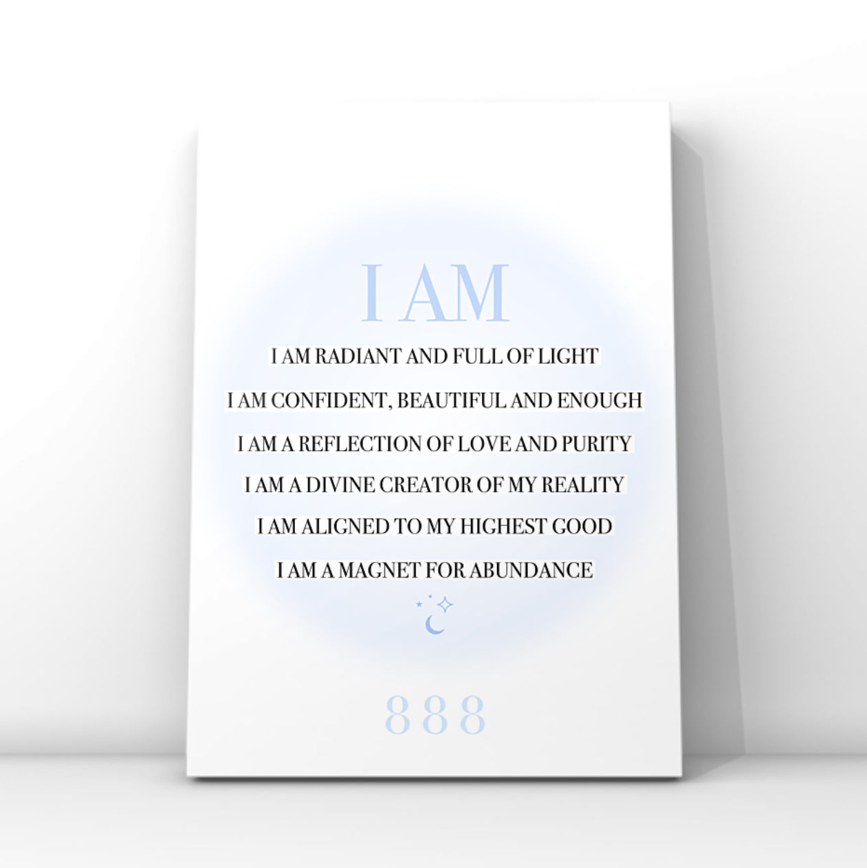 A4 spiritual typography print resting on a white surface, displaying a list of black I AM manifestation affirmations over a pastel blue aura gradient glow with an 888 angel number.