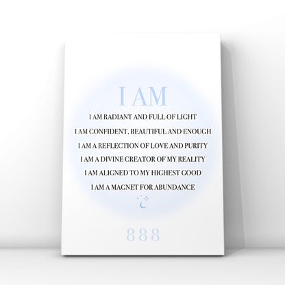A4 spiritual typography print resting on a white surface, displaying a list of black I AM manifestation affirmations over a pastel blue aura gradient glow with an 888 angel number.
