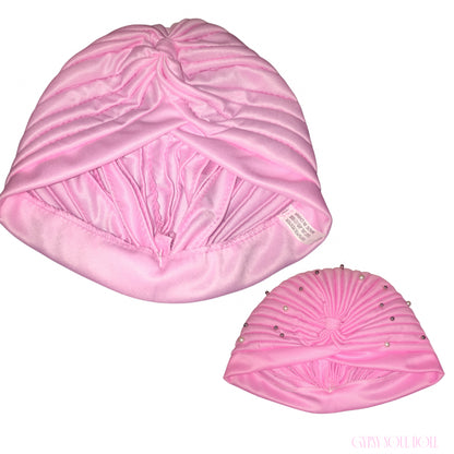 Two pink satin turban-style hair caps on a white background, one larger and one smaller, both with gathered pleated detailing and small rhinestone embellishments on the smaller cap.