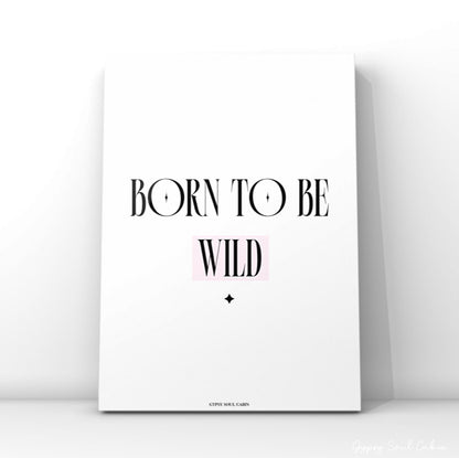Modern feminine bedroom typography poster displaying the words Born To Be Wild with a soft pink highlight behind the word Wild.