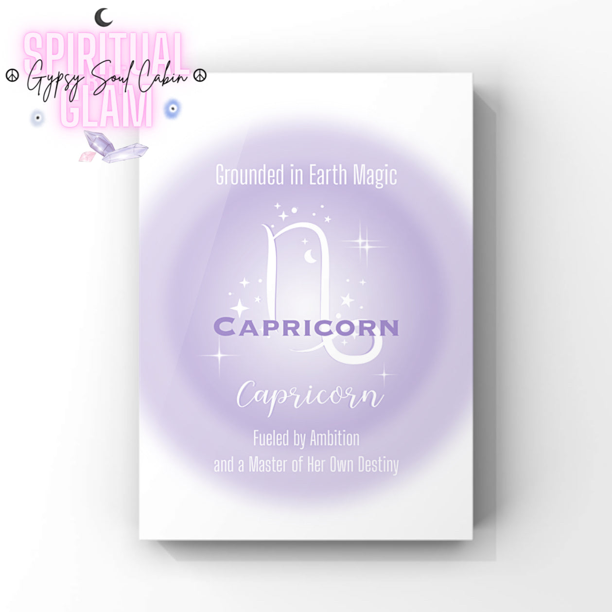 Minimalist A4 astrology wall art print featuring a soft purple aura background with a white Capricorn symbol and gothic typography reading Grounded in Earth Magic, Fueled by Ambition, and a Master of Her Own Destiny.