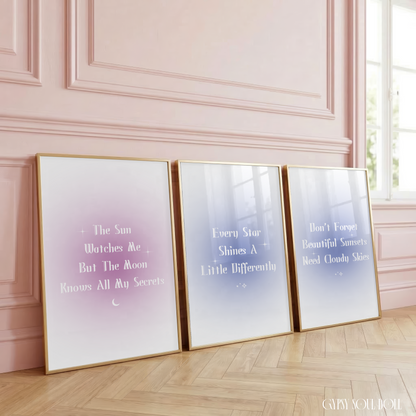 Set of three minimalist celestial wall art prints featuring colourful blue, purple, and periwinkle aura gradient backgrounds with bold white gothic typography quotes.