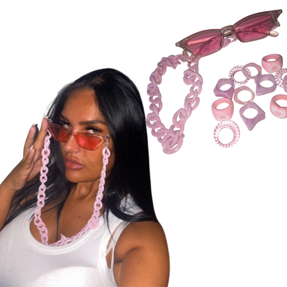 Side-by-side product view featuring a model wearing translucent pink Y2K cat-eye fashion glasses with a thick pink plastic link chain lanyard, alongside a separate floating product shot of the glasses and attached chain against a white background.