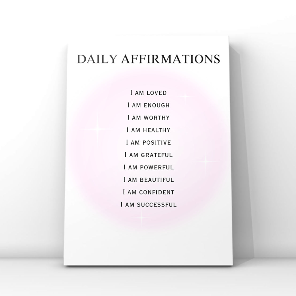 Minimalist A4 print showing a list of positive daily affirmations including I Am Loved, Enough, Worthy, and Successful over a glowing pink aura background.
