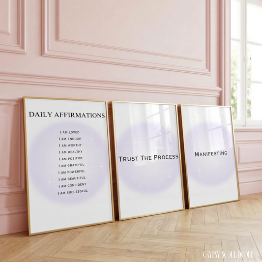 Set of three minimalist typography prints featuring a glowing pastel purple aura background with daily manifestation affirmations and spiritual quotes.