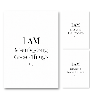 Set of three minimalist black and white A4 typography prints featuring the manifestation quotes I Am Trusting The Process, I Am Grateful For All I Have, and I Am Manifesting Great Things.