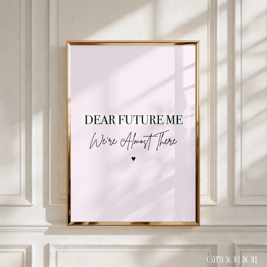 Chic A4 motivational print on a soft pink background featuring bold text reading Dear Future Me and elegant cursive script reading We're Almost There with a small black heart.