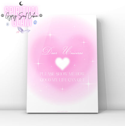 Minimalist A4 spiritual wall art print featuring a glowing pink heart aura gradient background with elegant white cursive script reading Dear Universe and a serif text manifestation block.