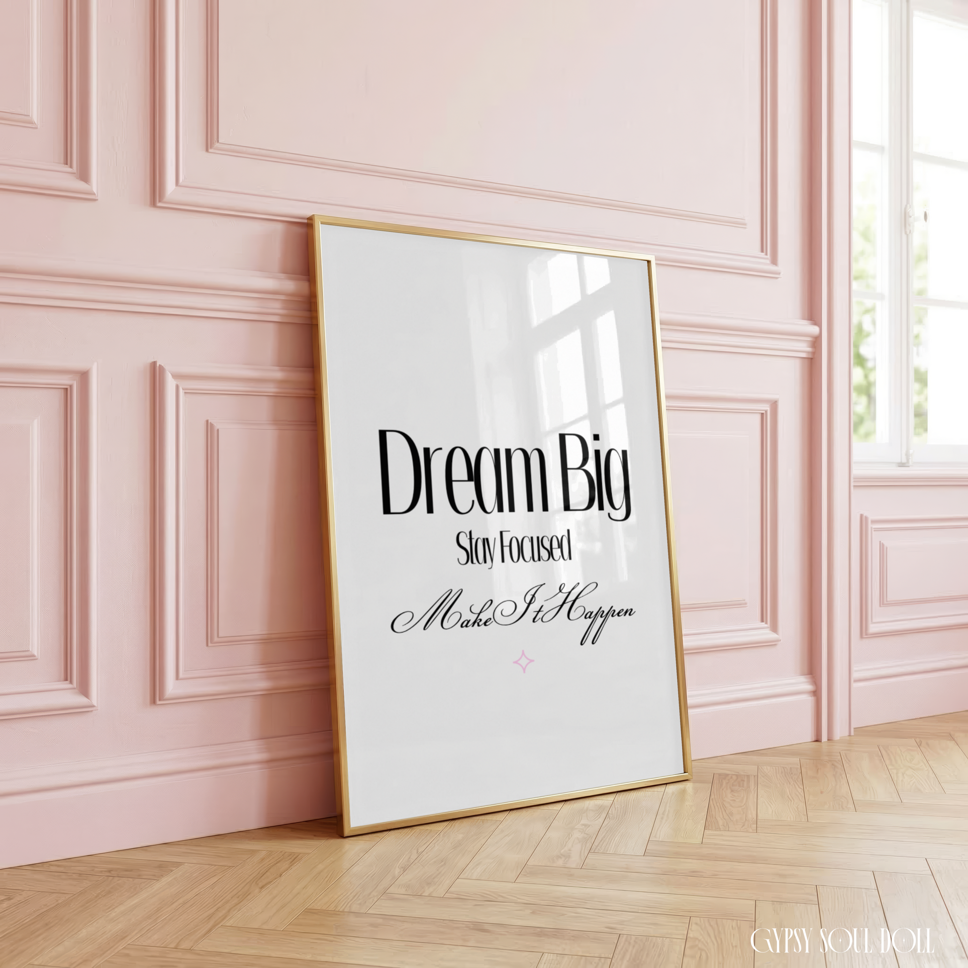 Minimalist A4 typographic print featuring bold black text reading Dream Big and Stay Focused, paired with centred pink cursive script reading Make It Happen.
