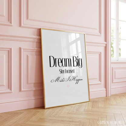 Minimalist A4 typographic print featuring bold black text reading Dream Big and Stay Focused, paired with centred pink cursive script reading Make It Happen.
