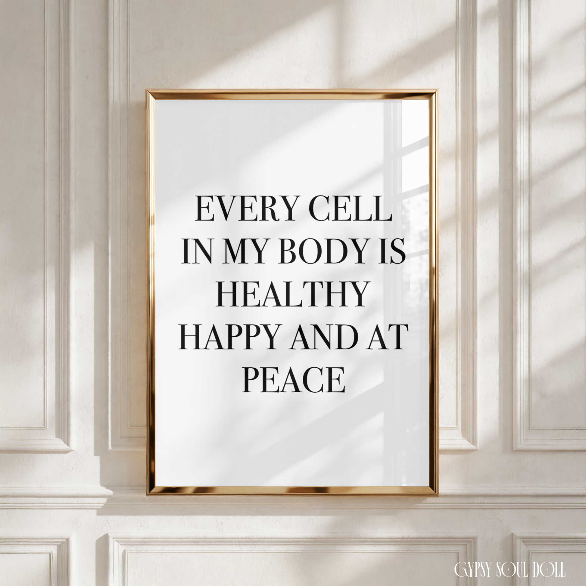 Elegant monochrome typography wall print with clean block lettering displaying the healing affirmation phrase Every Cell In My Body Is Healthy, Happy And At Peace.