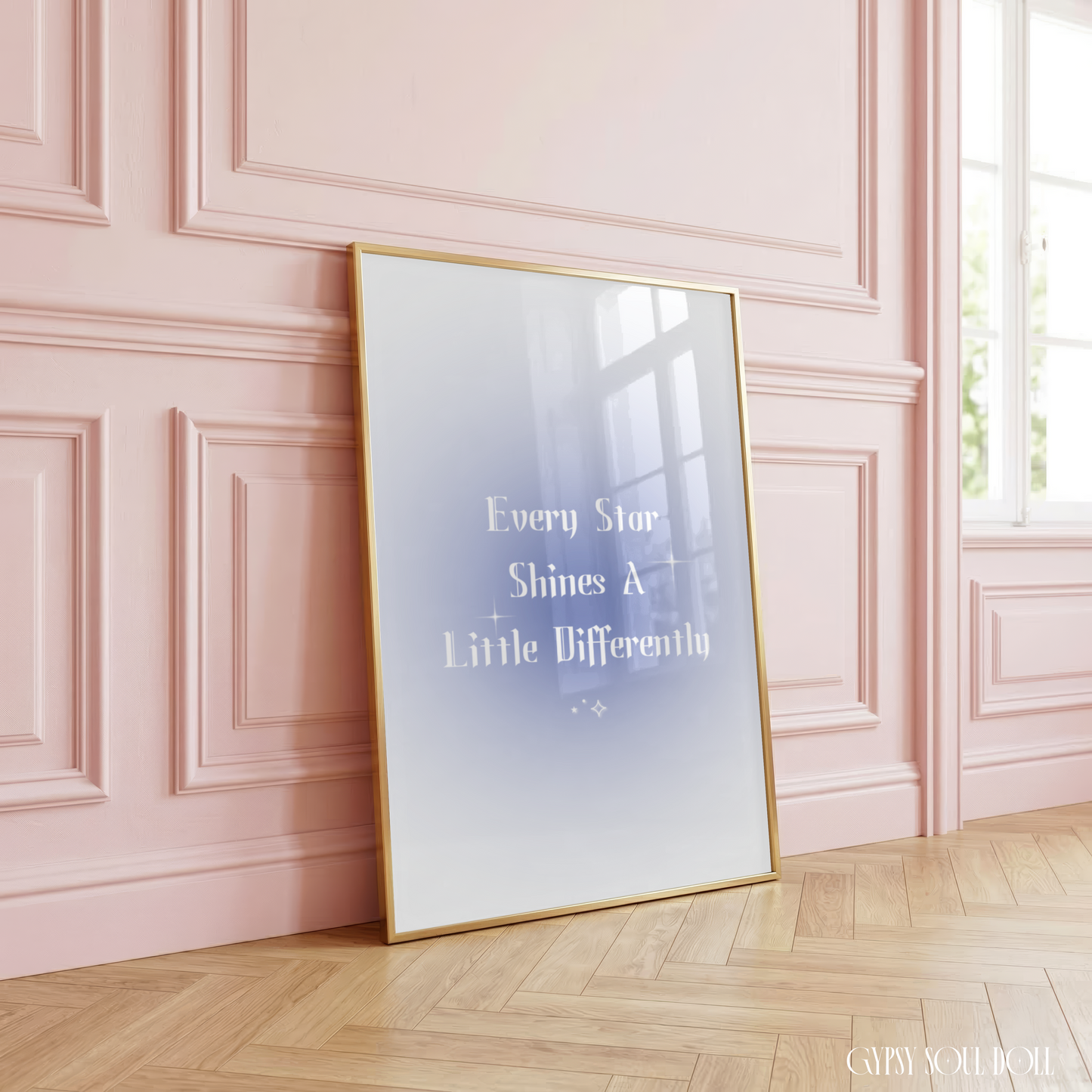 Minimalist A4 celestial wall art print featuring a soft blue aura gradient background with bold white gothic serif text reading Every Star Shines A Little Differently.