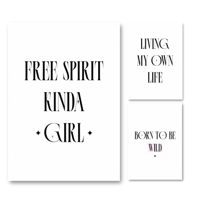 Three matching minimalist typography wall art prints, including Free Spirit Kinda Girl, Living My Own Life, and Born To Be Wild, with tall black serif typography and subtle star details on borderless white backgrounds.