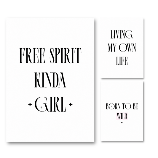 Three matching minimalist typography wall art prints, including Free Spirit Kinda Girl, Living My Own Life, and Born To Be Wild, with tall black serif typography and subtle star details on borderless white backgrounds.